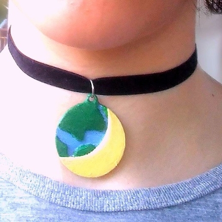 Moon and Earth medallion