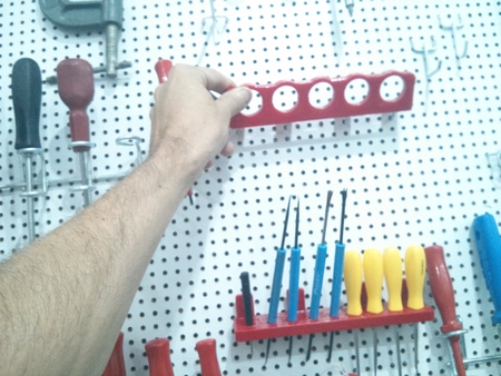 Custom tool holder for pegboard