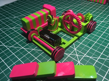 Modelo 3d de El rosa y el verde de domino de la máquina para impresoras 3d