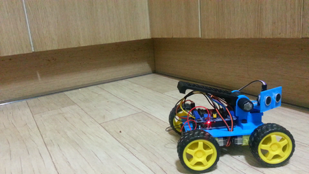 Create a robot car to avoid obstacles