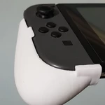 Modelo 3d de Nintendo interruptor de modo portátil apretones para impresoras 3d